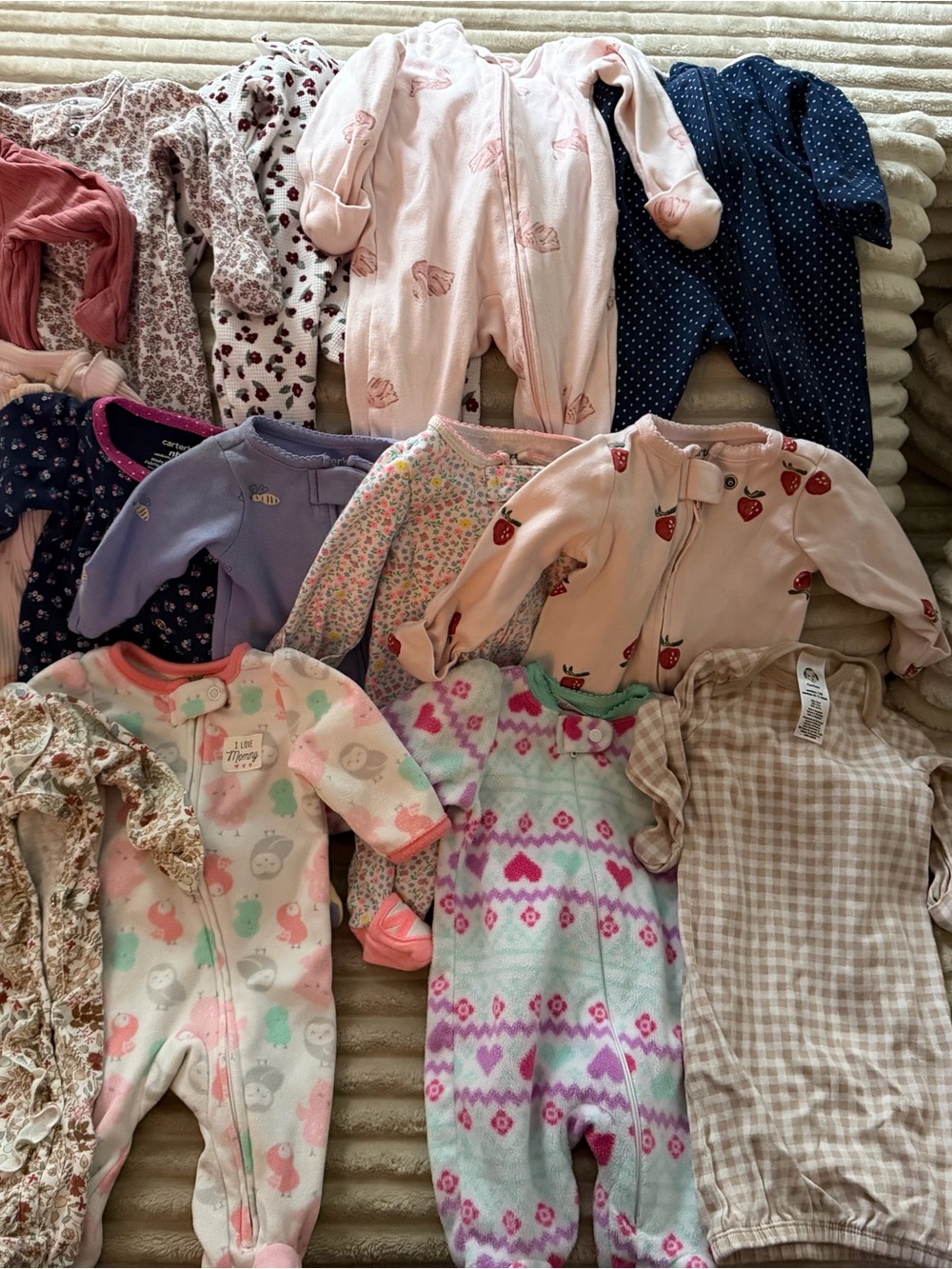 Multiple newborn outfits gently used.